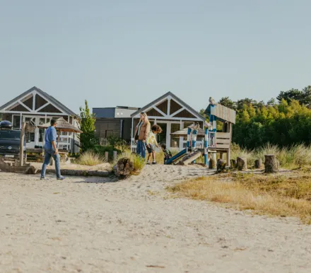 Strandhuis speeltuin gezin